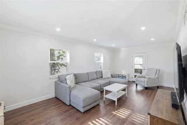 a living room with furniture and a couch