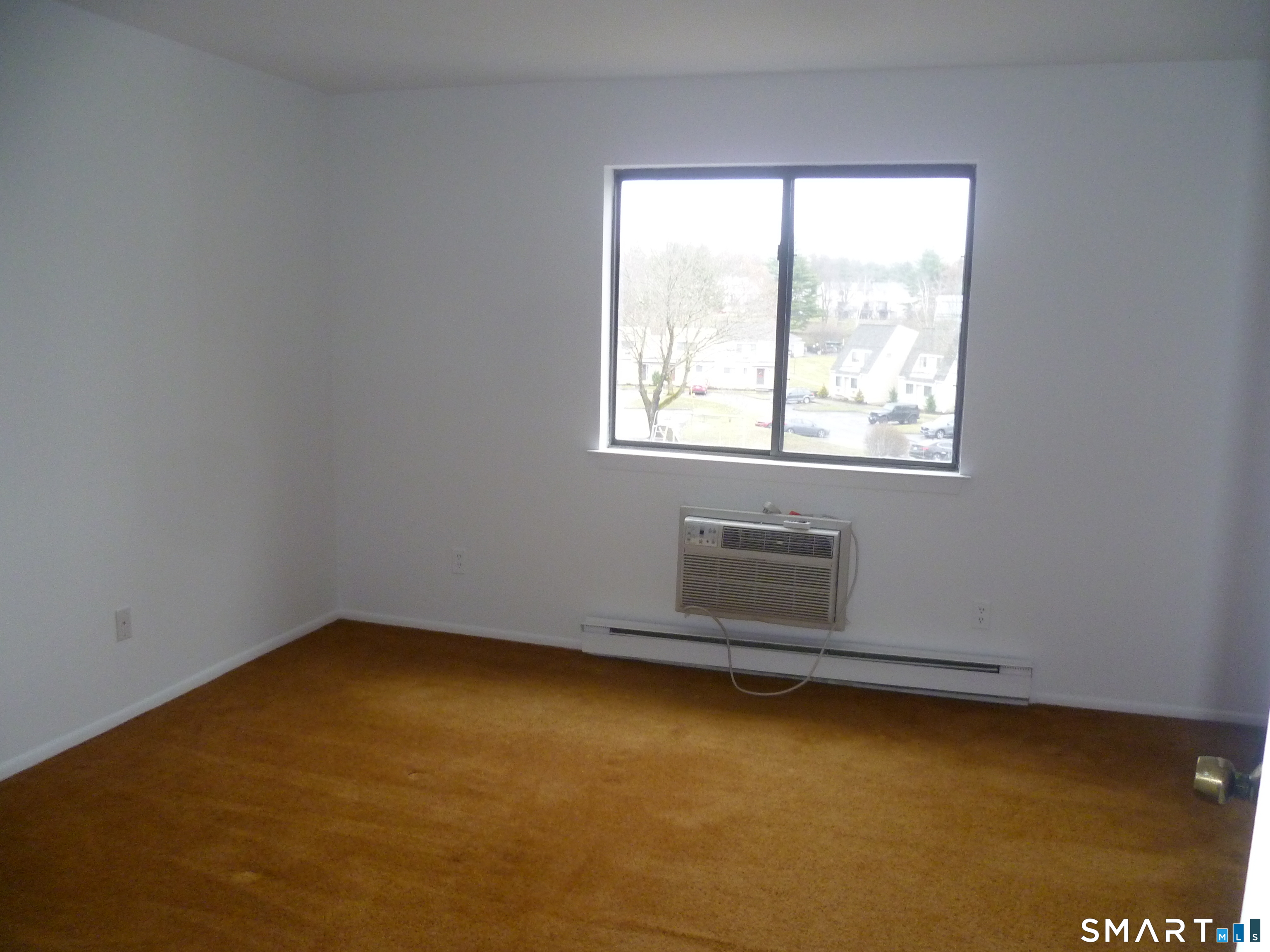 560 Yale Avenue, Unit 4 Meriden, CT 06450 - Photo 7 of 8 an empty room with a window