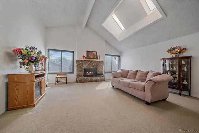 a living room with furniture and a couch