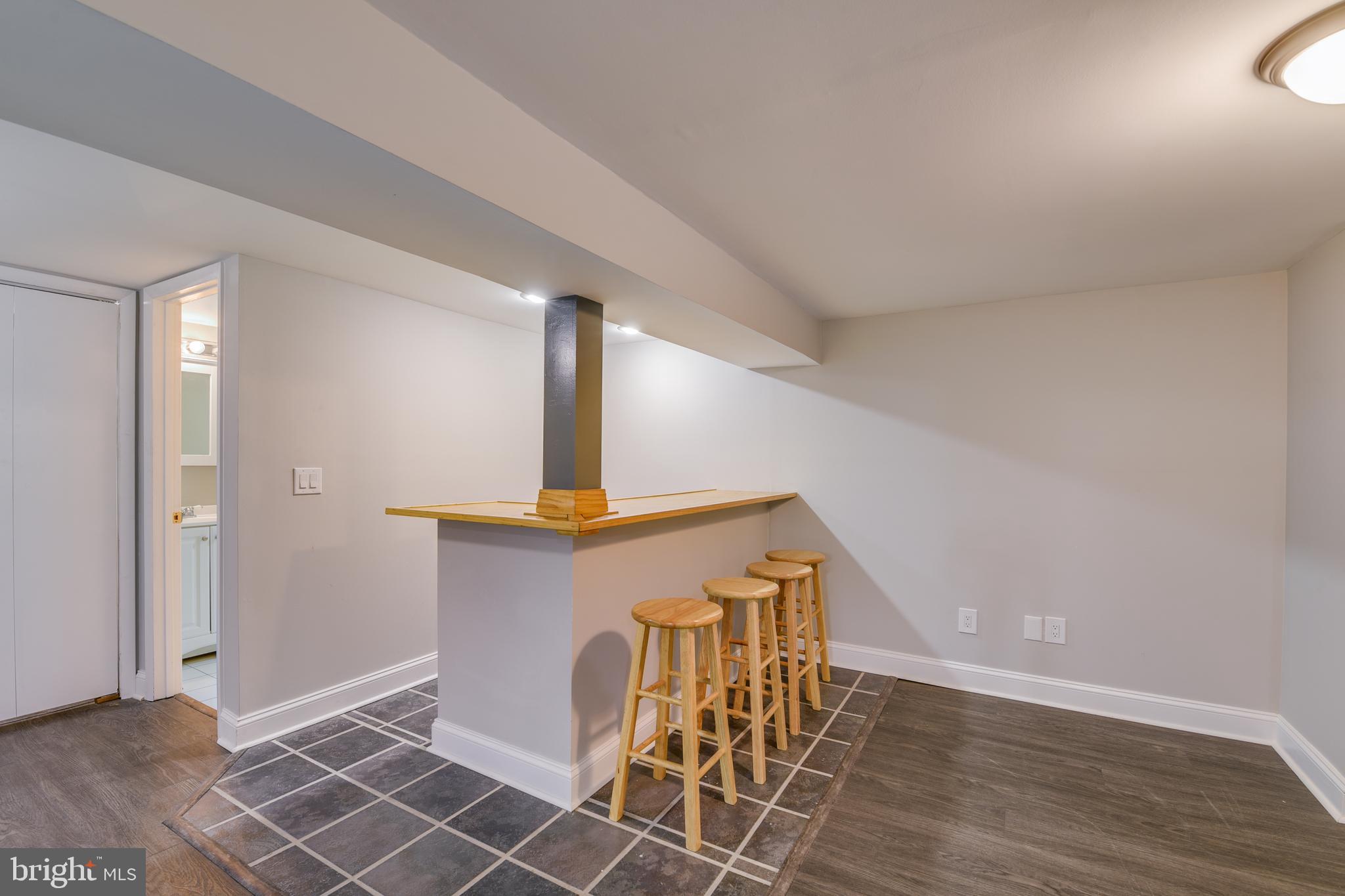 8408 Maryland Road Pasadena, MD 21122 - Photo 36 of 47 Lower Level Finished Basement w/ WET BAR