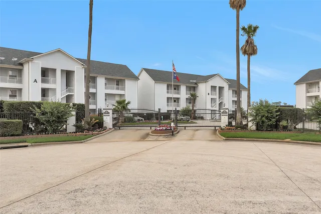 a view of a house with sitting area and furniture