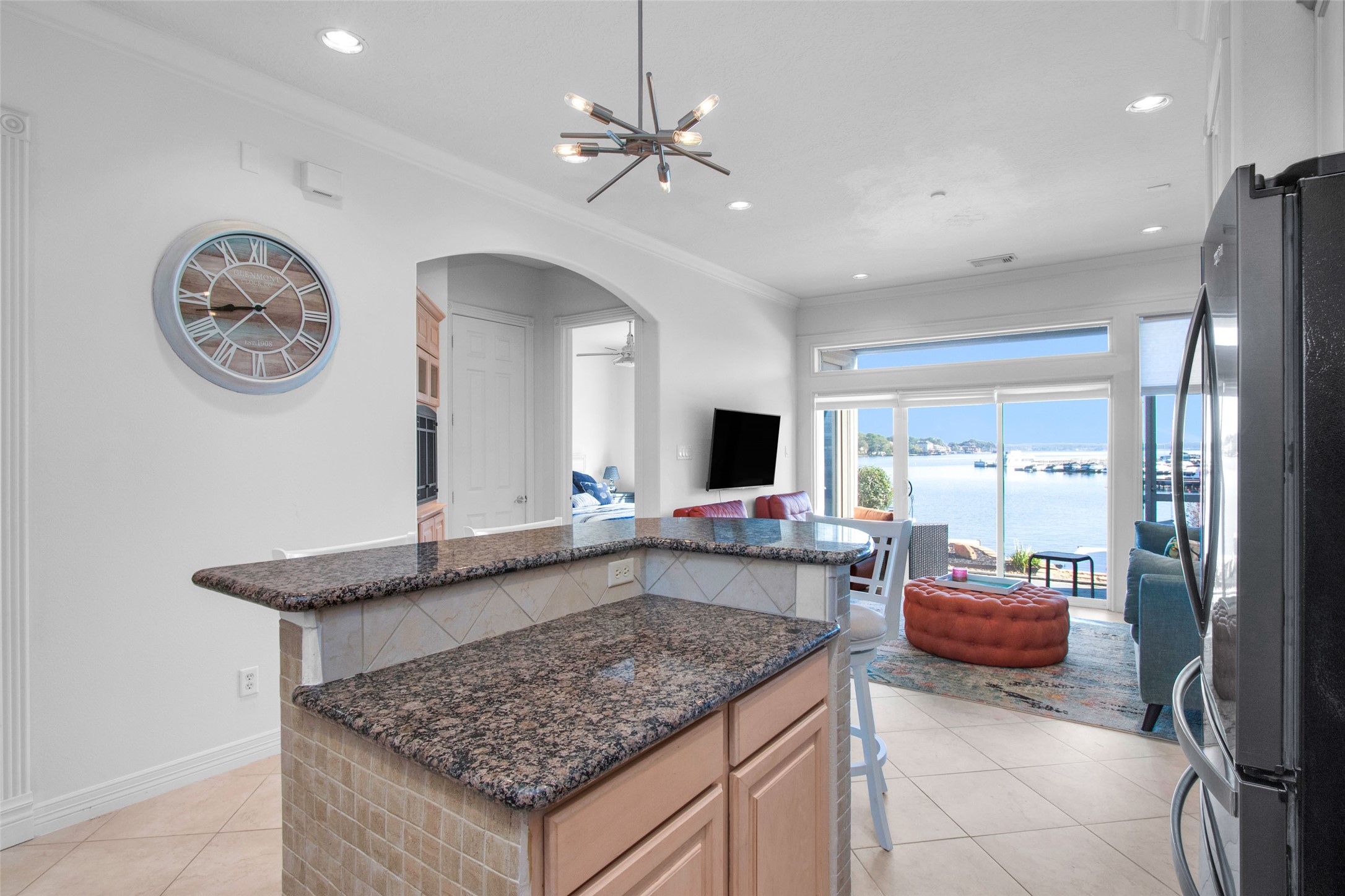 168 Lake Point Boulevard Conroe, TX 77356 - Photo 6 of 24 a kitchen with a table and chairs