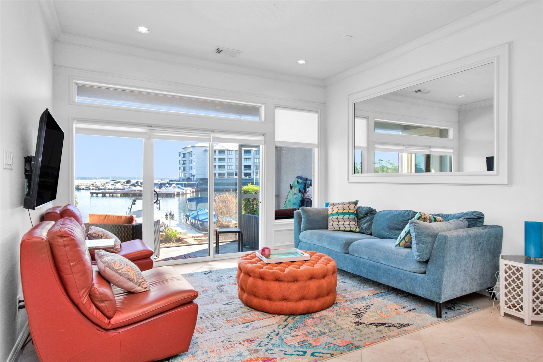 168 Lake Point Boulevard Conroe, TX 77356 - Photo 7 of 24 a living room with furniture and a large window