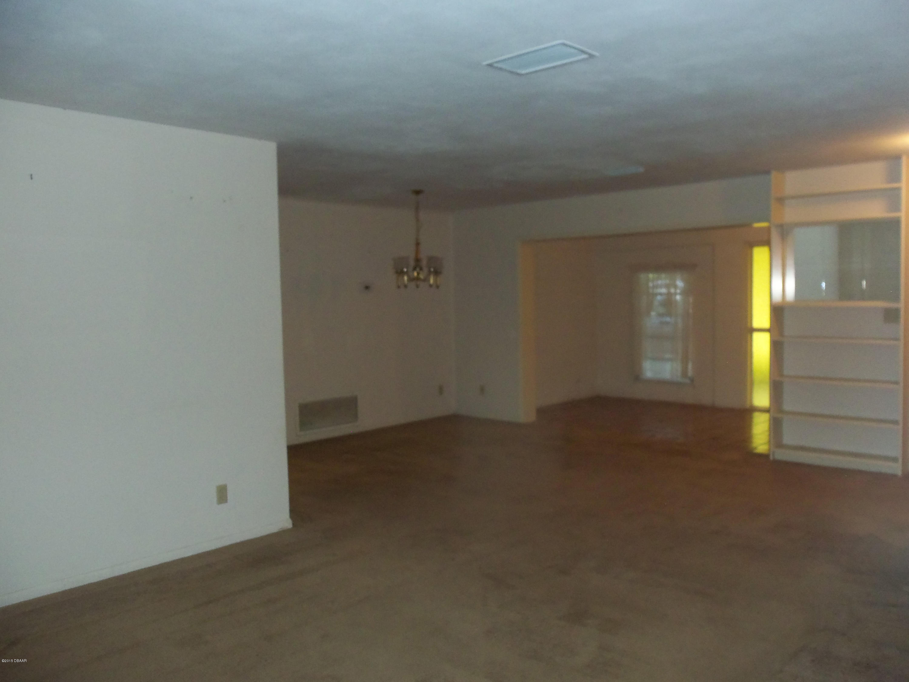 1396 Sunland Road Daytona Beach, FL 32114 - Photo 8 of 13 Dining Room & Living Room