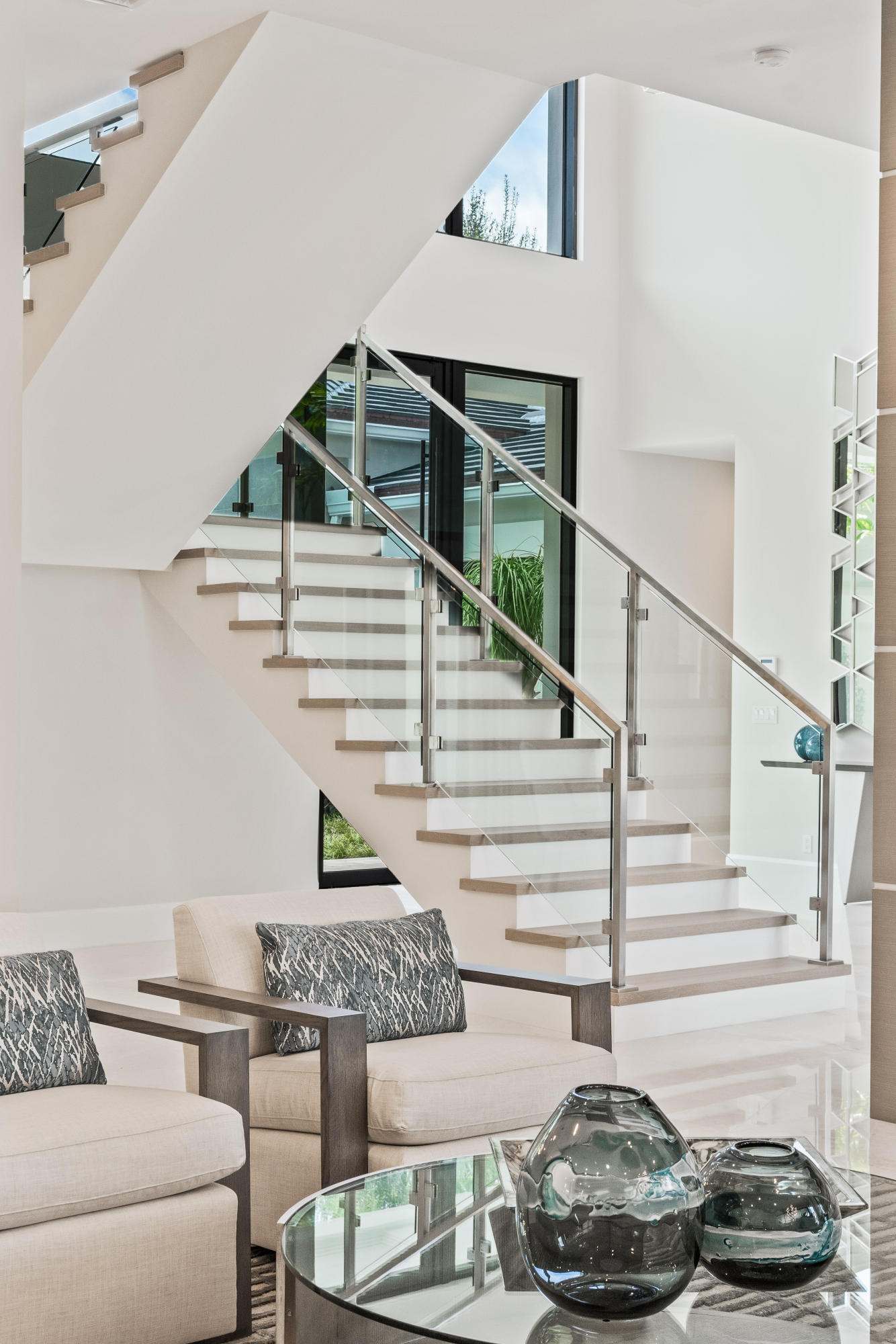 106 Quayside Drive Jupiter, FL 33477 - Photo 15 of 77 Staircase from Family Room