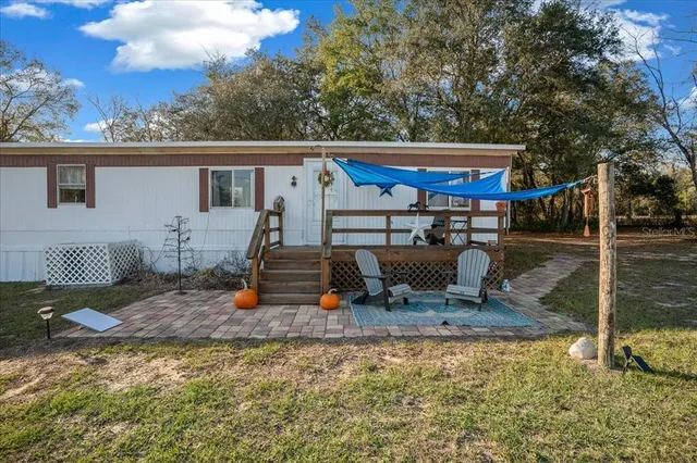a view of outdoor space yard deck patio and slide