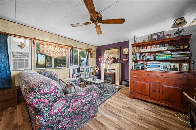 a bed room with furniture and a fireplace