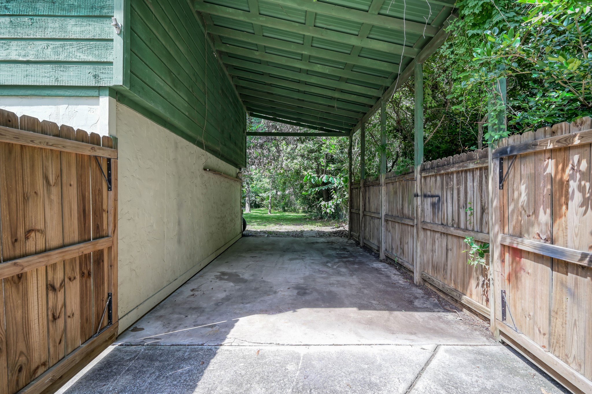 2207 Arendale Lane Spring, TX 77386 - Photo 21 of 30 Additional covered parking area located beside the garage.