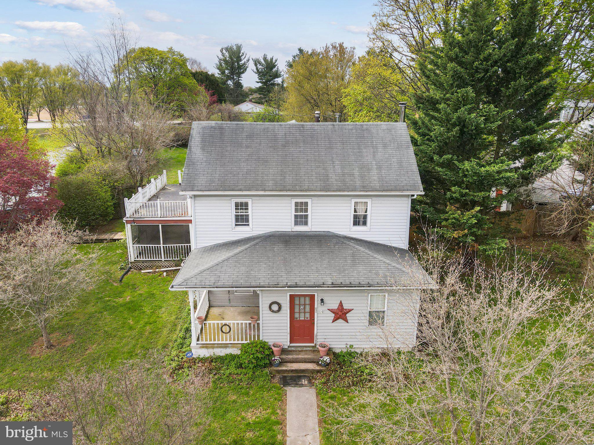 15921 Frederick Road Woodbine, MD 21797 - Photo 32 of 41 Charming home with lush greenery.