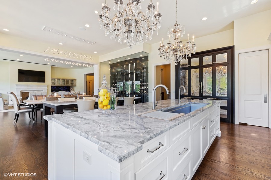 530 South Ridge Road Lake Forest, IL 60045 - Photo 12 of 46 a large kitchen with stainless steel appliances granite countertop a lot of counter space and wooden floors
