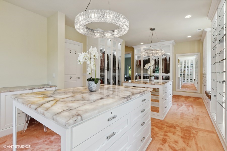 530 South Ridge Road Lake Forest, IL 60045 - Photo 21 of 46 a kitchen with stainless steel appliances kitchen island granite countertop a table and chairs in it