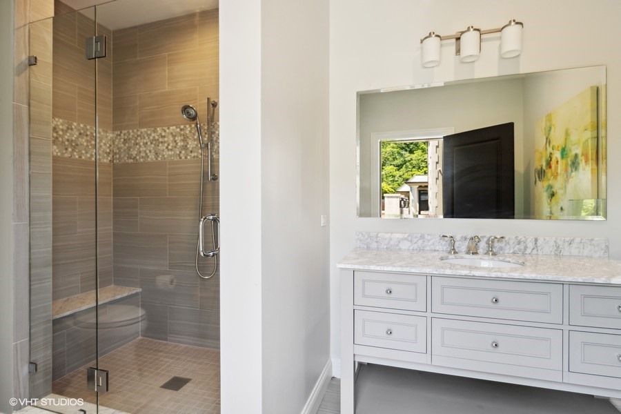 530 South Ridge Road Lake Forest, IL 60045 - Photo 40 of 46 a bathroom with a double vanity sink mirror and shower