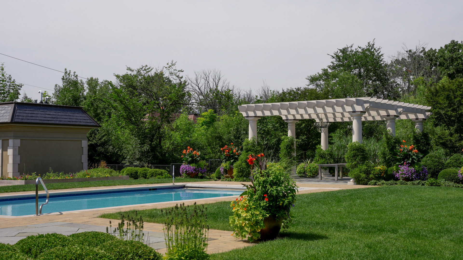 530 South Ridge Road Lake Forest, IL 60045 - Photo 42 of 46 a view of a garden with swimming pool and sitting area