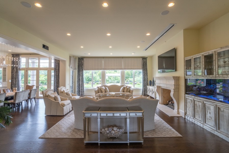 530 South Ridge Road Lake Forest, IL 60045 - Photo 5 of 46 a living room with fireplace furniture and a large window