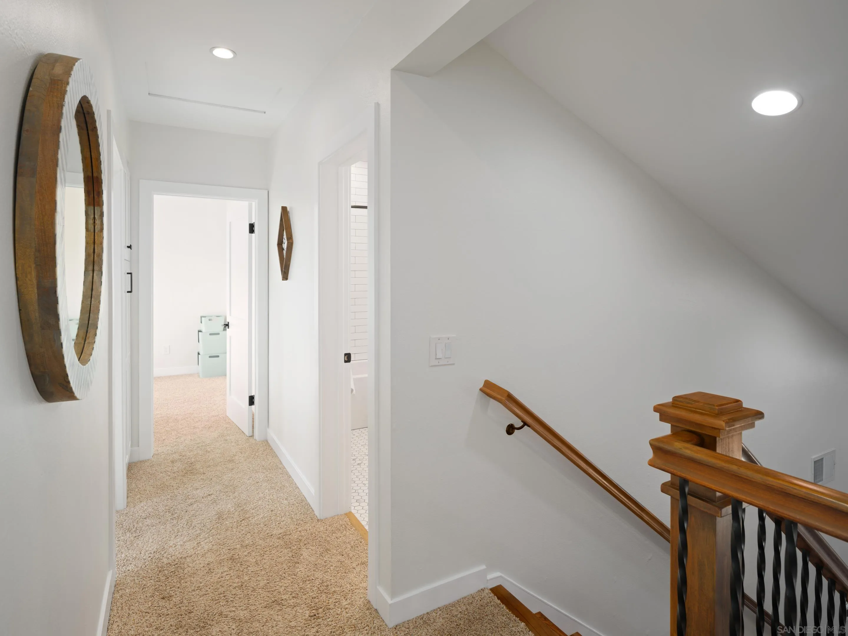 7053 Snapdragon Drive Carlsbad, CA 92011 - Photo 18 of 35 a view of a hallway with a elevator