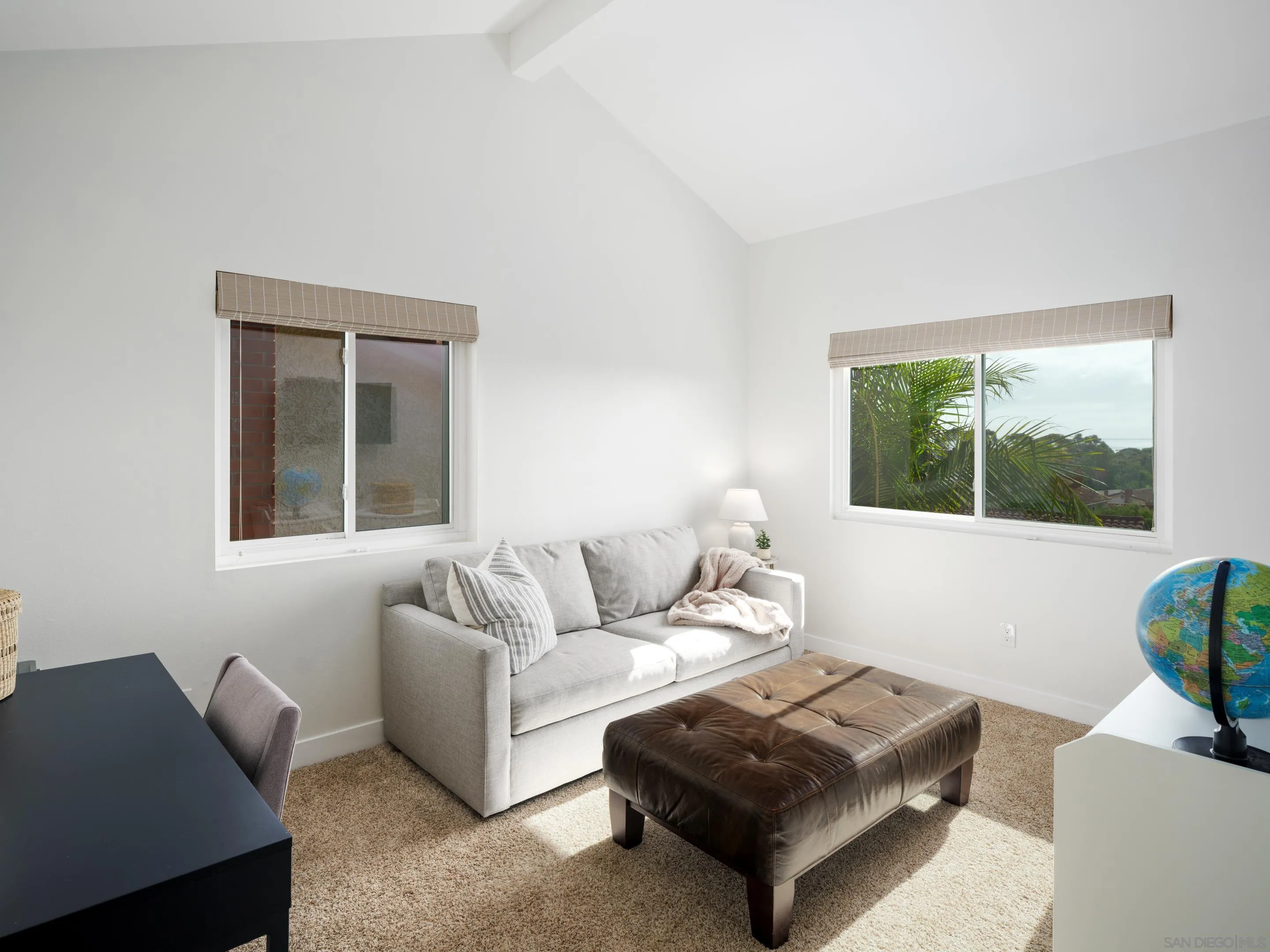 7053 Snapdragon Drive Carlsbad, CA 92011 - Photo 19 of 35 a living room with furniture and a window