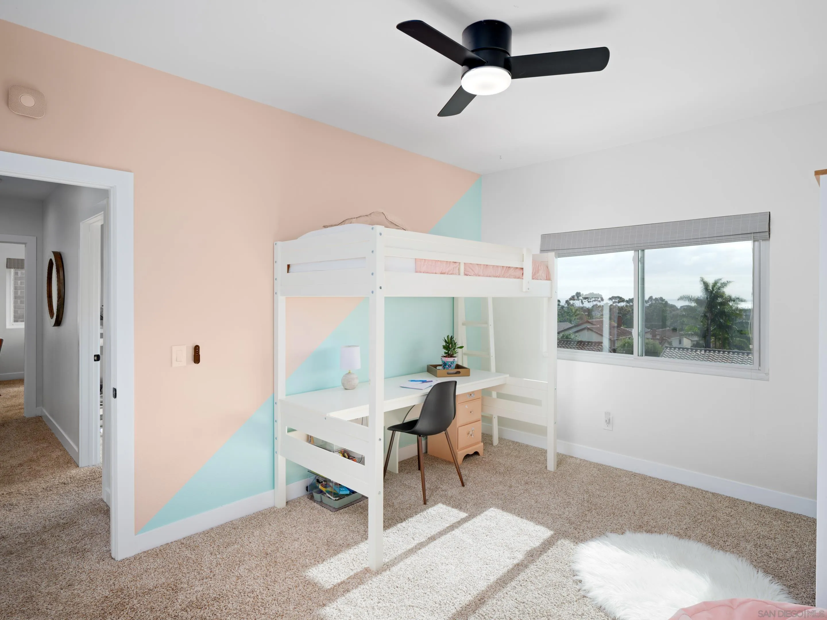 7053 Snapdragon Drive Carlsbad, CA 92011 - Photo 22 of 35 a living room with furniture and a window