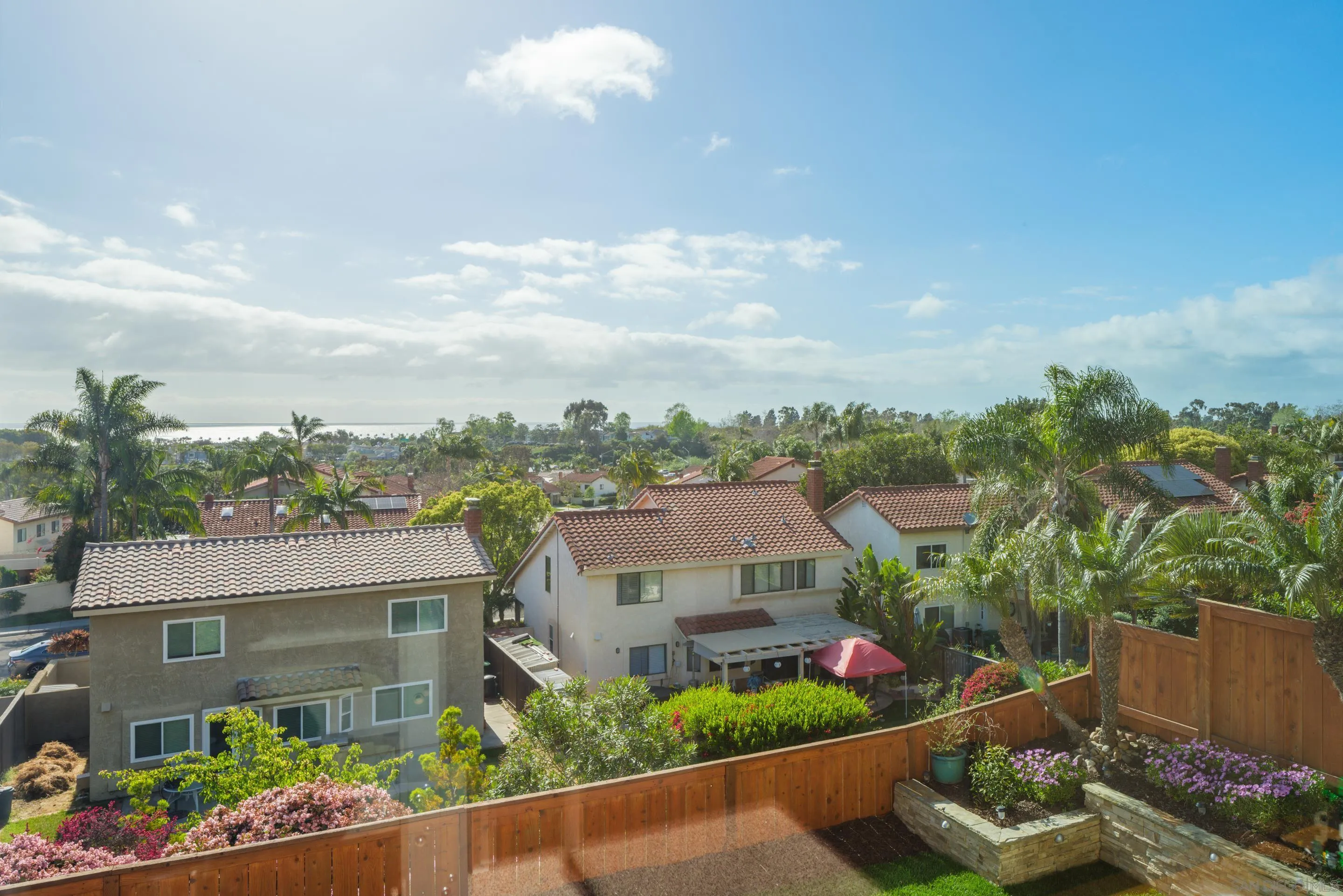 7053 Snapdragon Drive Carlsbad, CA 92011 - Photo 28 of 35 an aerial view of a house with a yard and outdoor seating