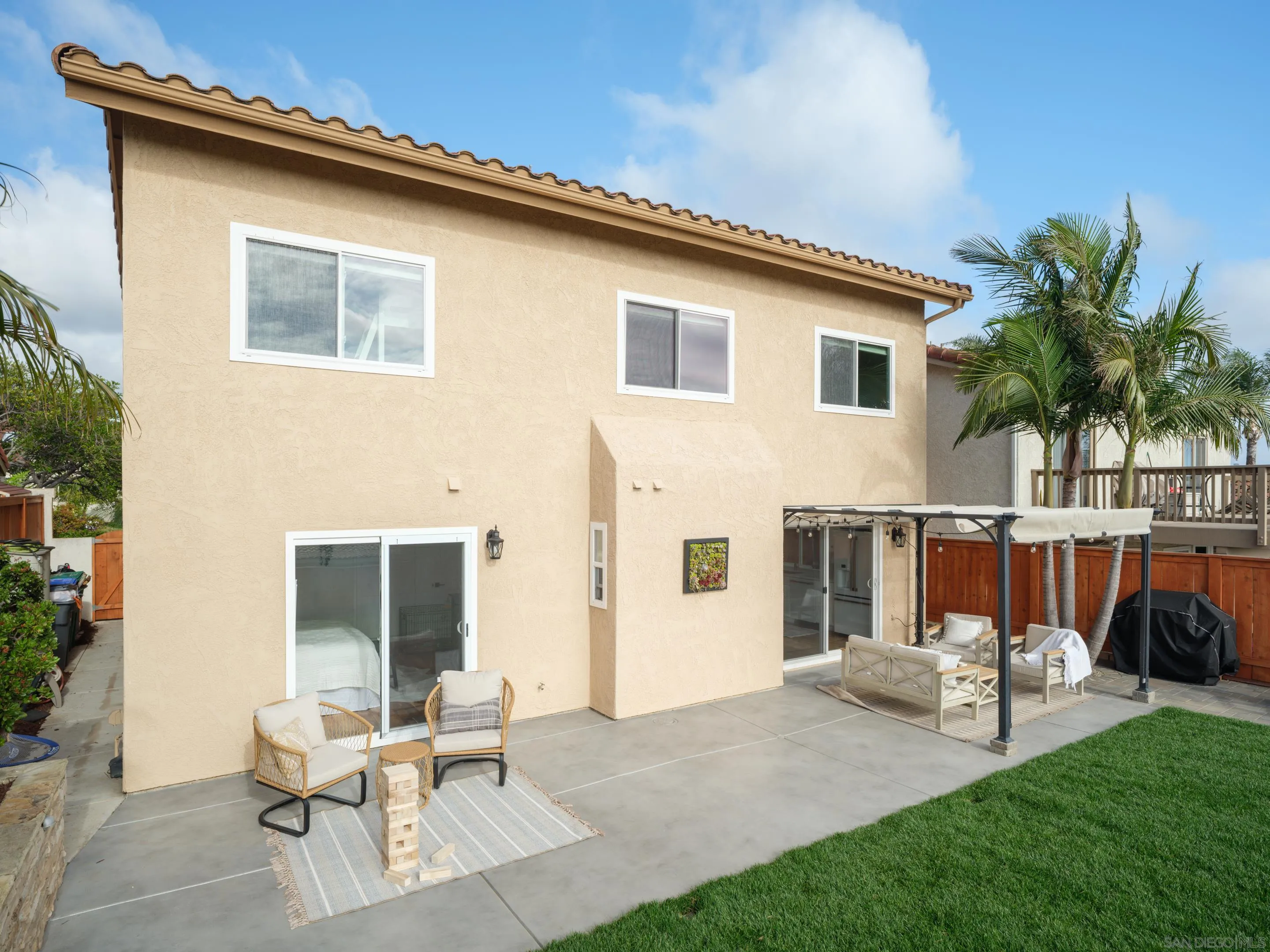 7053 Snapdragon Drive Carlsbad, CA 92011 - Photo 31 of 35 a view of a house with backyard and sitting area