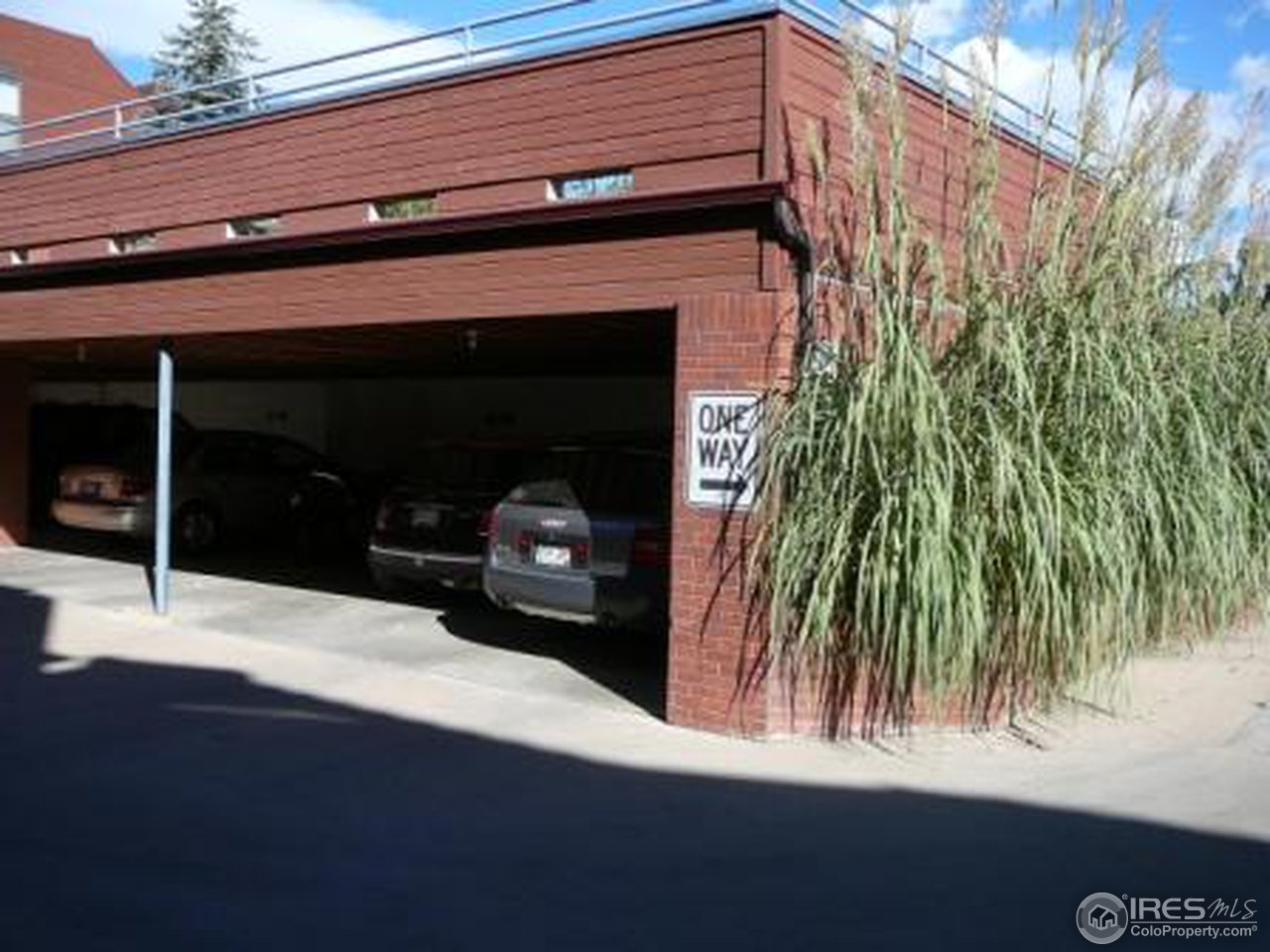 856 Walnut Street, Unit A Boulder, CO 80302 - Photo 13 of 13 a front view of a house with a yard