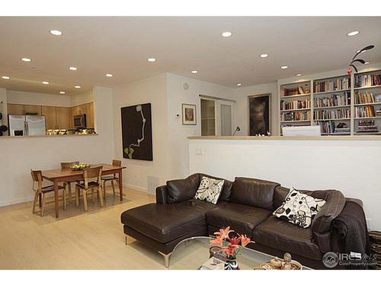 856 Walnut Street, Unit A Boulder, CO 80302 - Photo 3 of 13 a living room with furniture and a dining room