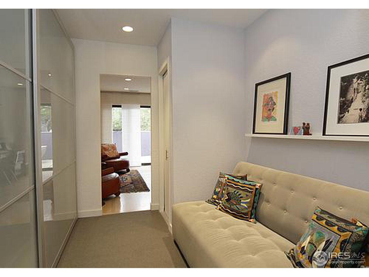 856 Walnut Street, Unit A Boulder, CO 80302 - Photo 8 of 13 a living room with furniture and a bed