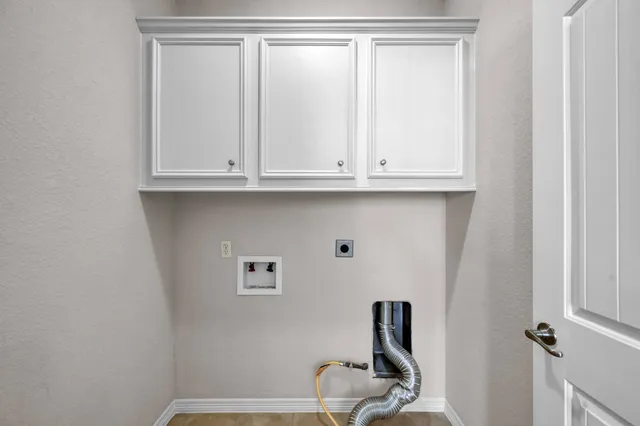 a bathroom with a sink and a window