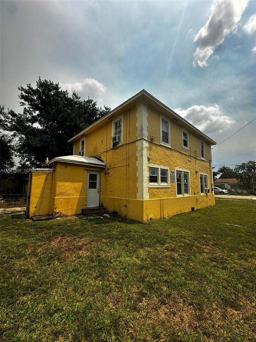1925 Northwest 56th Street Miami, FL 33142 - Photo 2 of 27 a house view with a outdoor space