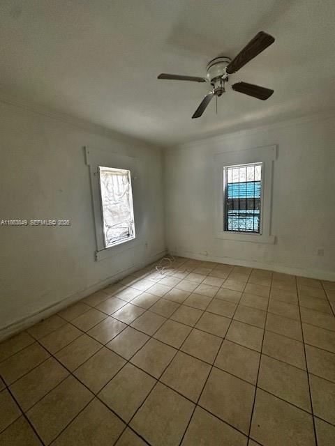 1925 Northwest 56th Street Miami, FL 33142 - Photo 6 of 27 a view of an empty room and window
