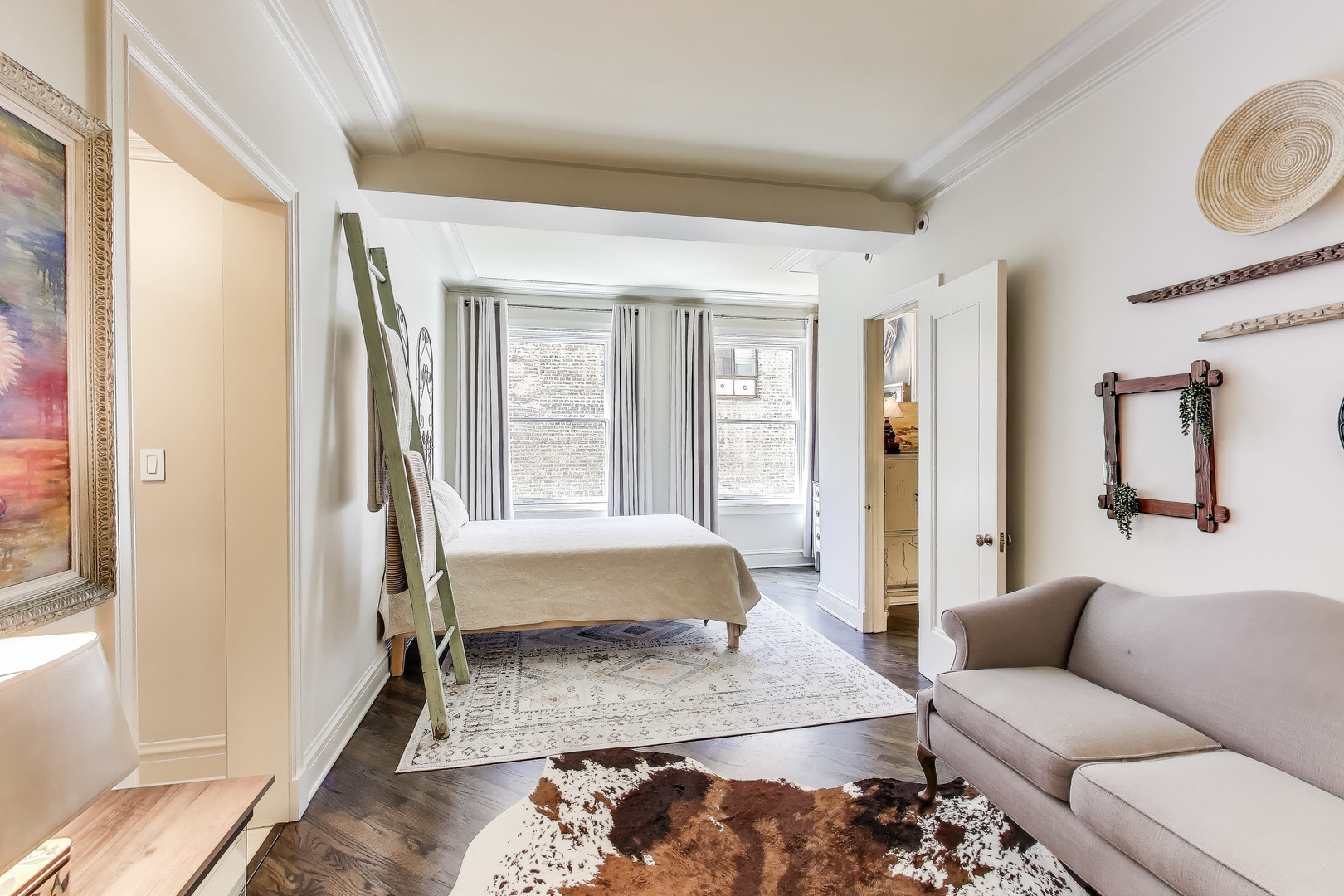 1255 North State Parkway, Unit 2E3E Chicago, IL 60610 - Photo 17 of 38 a living room with a couch and a window