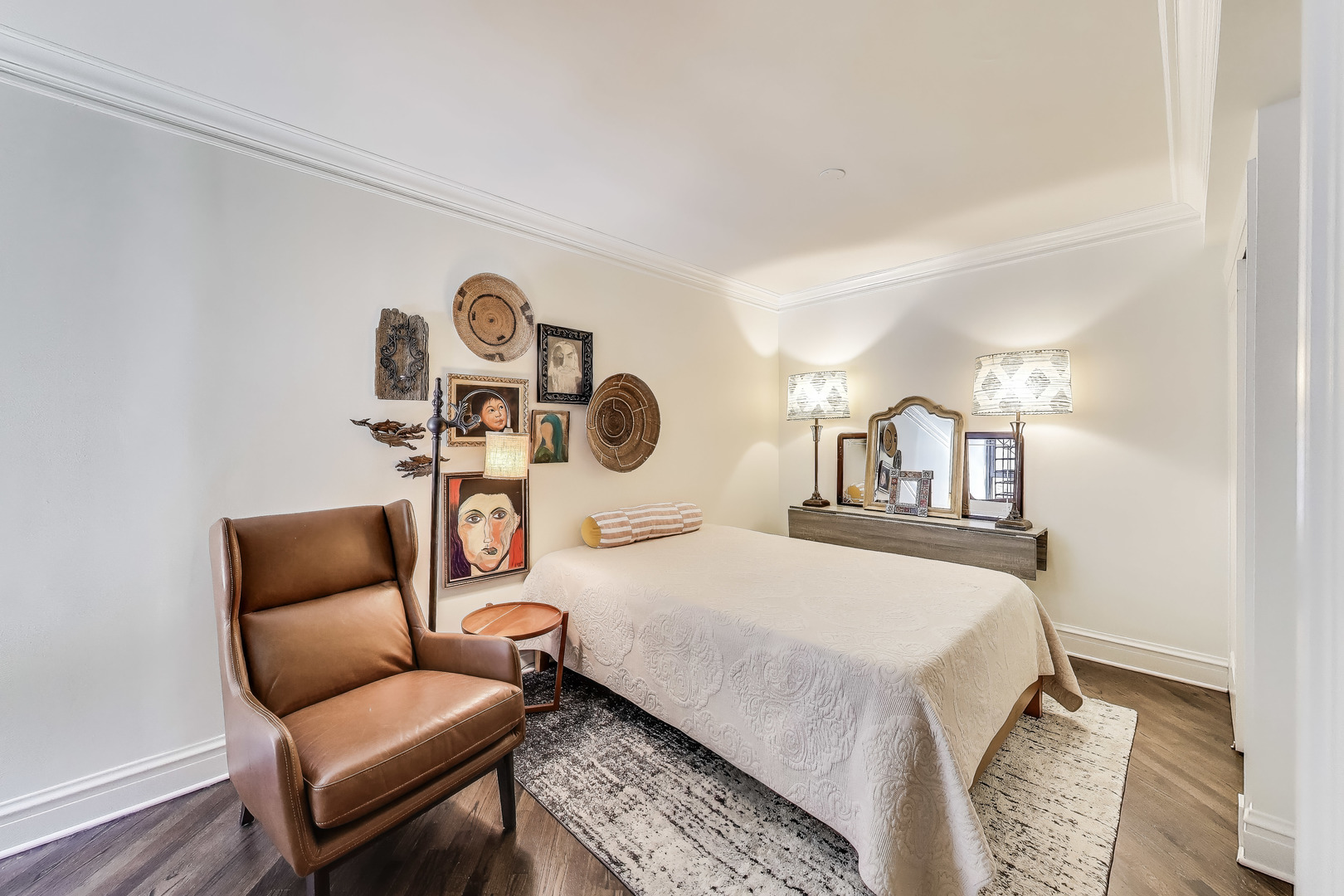 1255 North State Parkway, Unit 2E3E Chicago, IL 60610 - Photo 23 of 38 a bedroom with bed and a couch