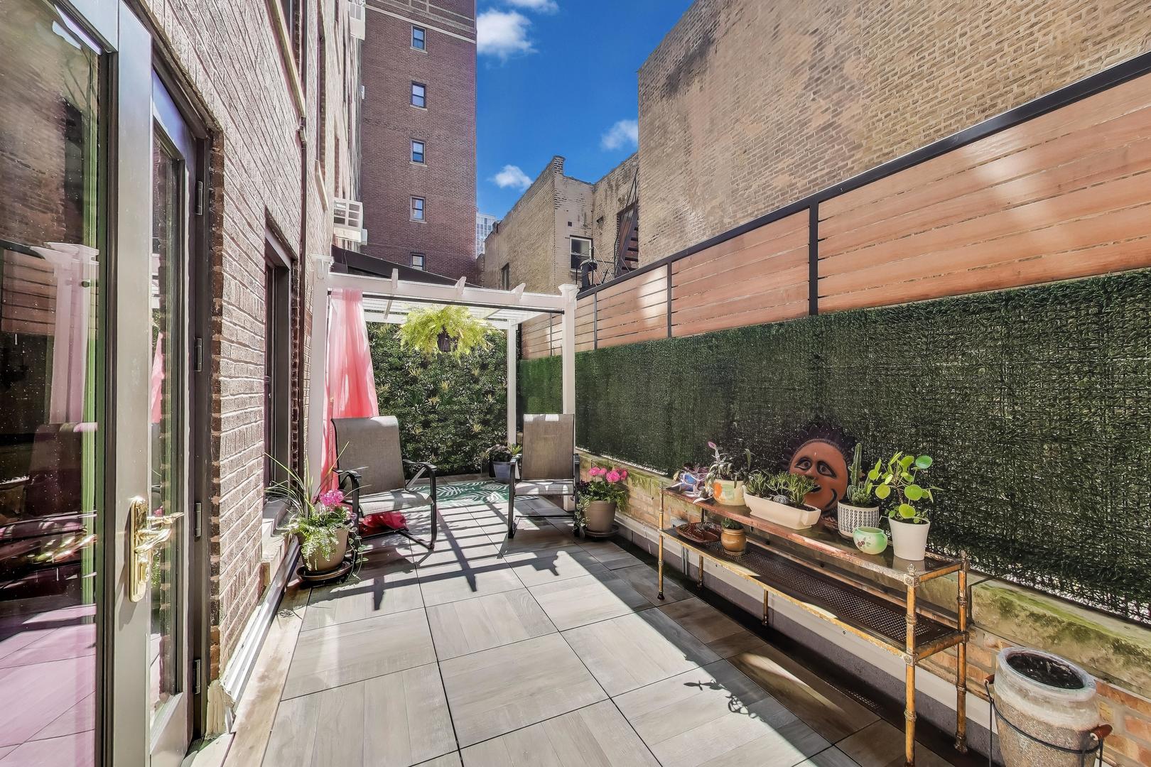 1255 North State Parkway, Unit 2E3E Chicago, IL 60610 - Photo 30 of 38 a room with patio furniture