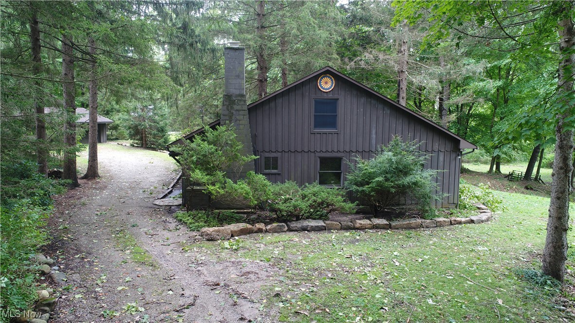 13696 Sperry Road Novelty, OH 44072 - Photo 22 of 40 View of side of home