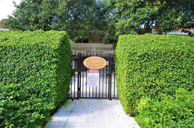 a view of a back yard with green space