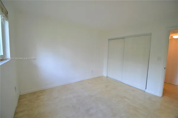 an empty room with an entryway