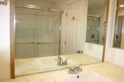 1350 Cabrillo Drive Hemet, CA 92543 - Photo 20 of 30 a bathroom with a bathtub and a shower