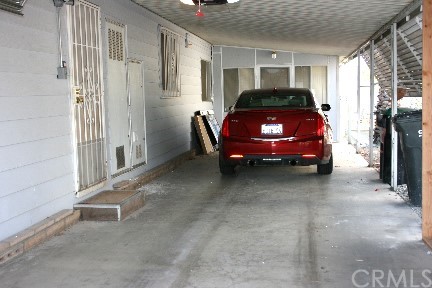 1350 Cabrillo Drive Hemet, CA 92543 - Photo 28 of 30 a car parked in front of a house