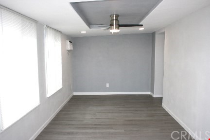1350 Cabrillo Drive Hemet, CA 92543 - Photo 3 of 30 a view of an empty room with wooden floor