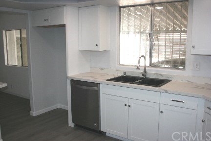 1350 Cabrillo Drive Hemet, CA 92543 - Photo 8 of 30 a kitchen with a sink cabinets and window