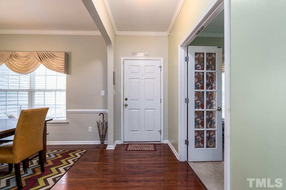 3612 Weir Way Raleigh, NC 27616 - Photo 3 of 19 a view of a livingroom with furniture and wooden floor