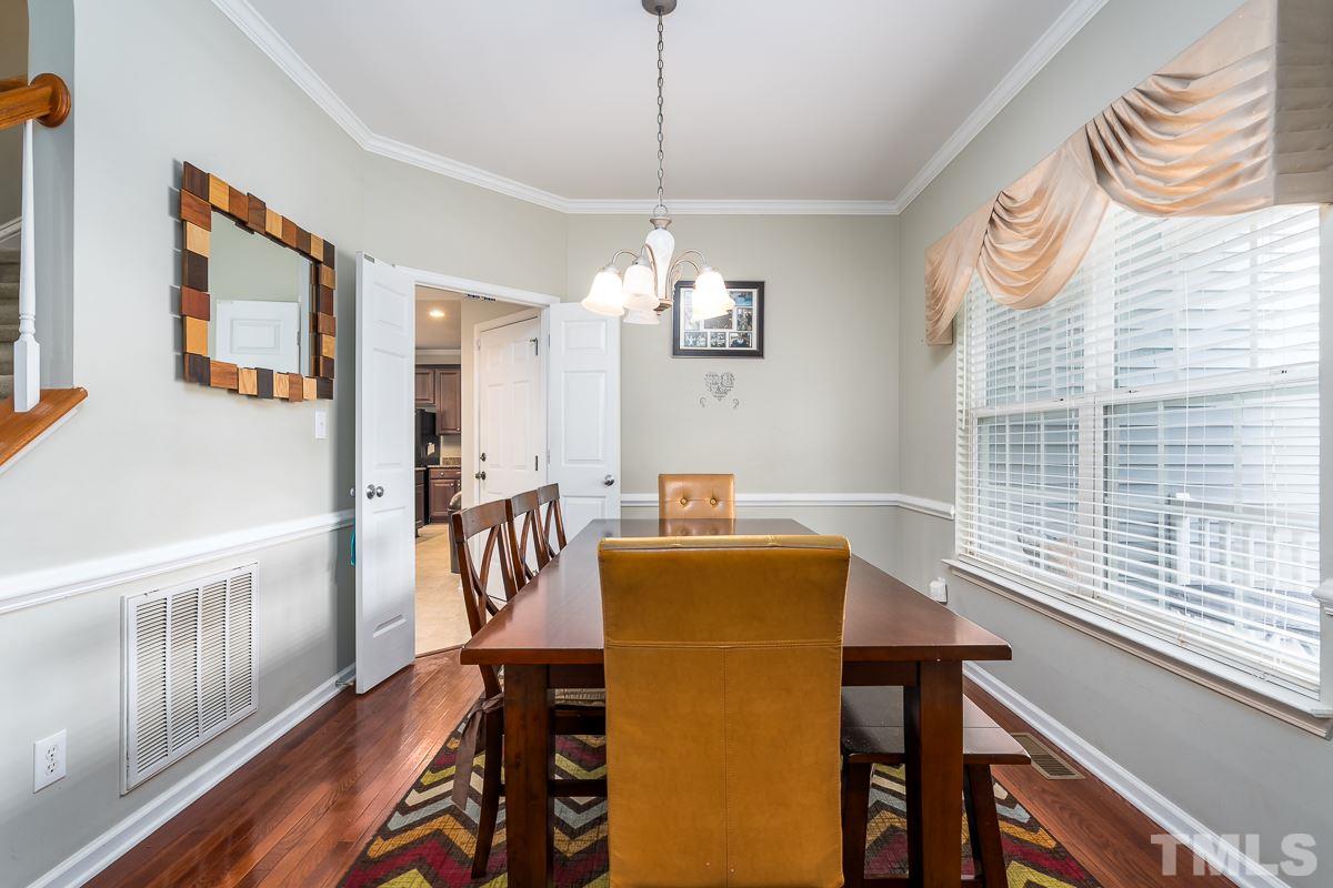 3612 Weir Way Raleigh, NC 27616 - Photo 4 of 19 a dining room with furniture and window
