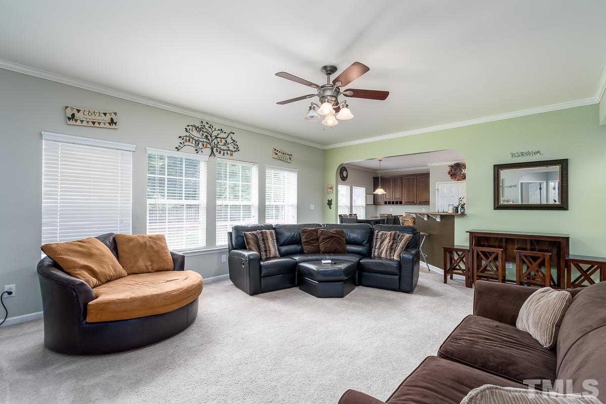 3612 Weir Way Raleigh, NC 27616 - Photo 5 of 19 a living room with furniture and a large window