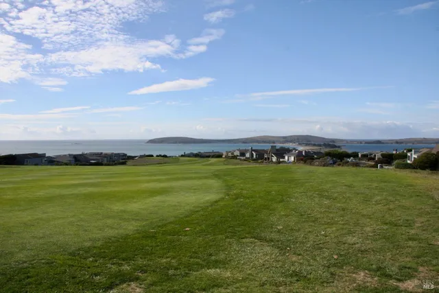 a view of an ocean and city