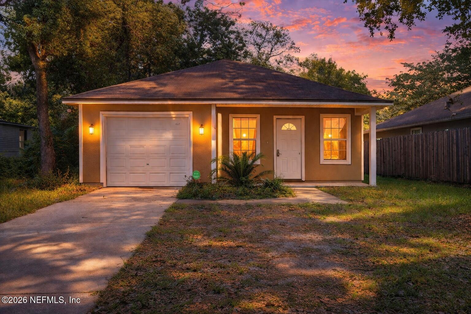 4527 Clairmont Road Jacksonville, FL 32207 - Photo 1 of 40 a front view of a house with garden