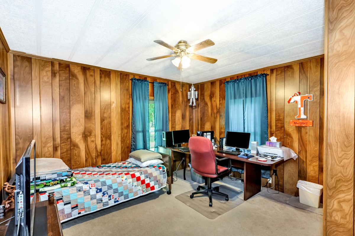 272 Jones Road Taft, TN 38488 - Photo 20 of 40 a bedroom with furniture and a window