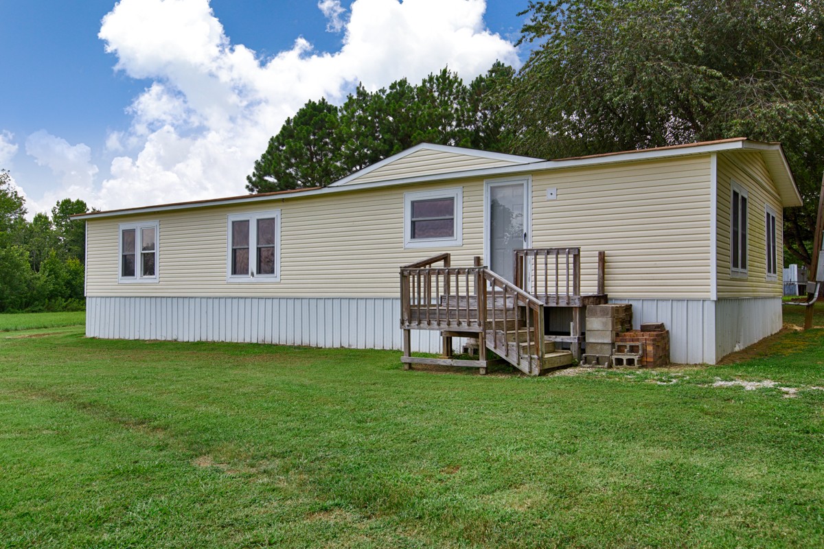 272 Jones Road Taft, TN 38488 - Photo 35 of 40 a view of a house with a yard and sitting area