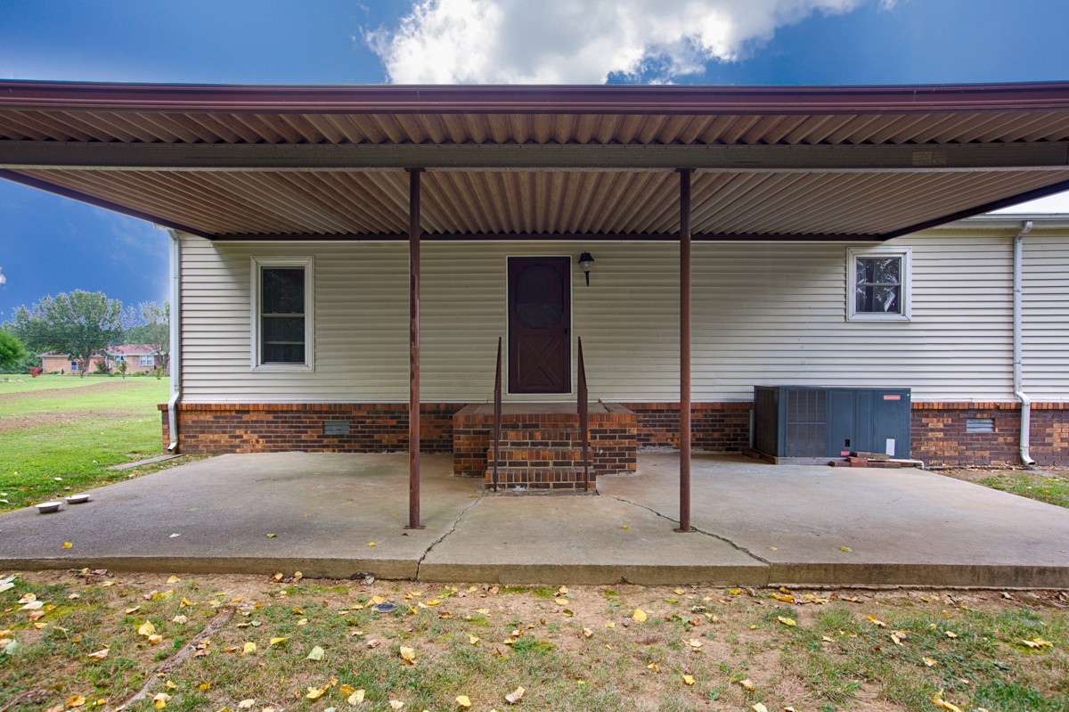 272 Jones Road Taft, TN 38488 - Photo 5 of 40 a view of a house with a yard