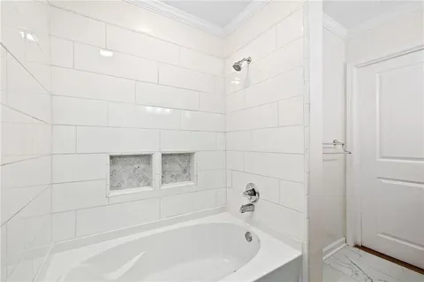 a bathroom with a bathtub