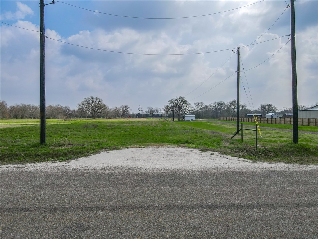 10826 Forsthoff Road Bryan, TX 77808 - Photo 11 of 11 a view of a house with a big yard and a view of a park