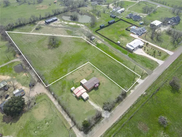 a view of field with tree s